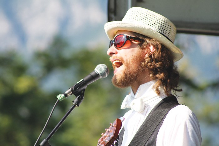 Maria in the Shower's Martin Reisle delivers his high energy vocals to the sun-kissed crowd at the first annual Steamboat Mountain Music Festival that took place in Edgewater on Saturday (July 7). Held in conjunction with Edgewater's 100th anniversary celebrations