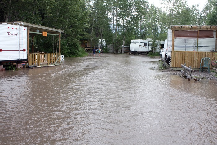 Floodwaters can be as much as two feet deep in spots at the Shadybrook Resort in Windermere.
