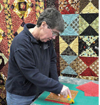 About a dozen ladies gathered to start making quilts which will be sent around the world with Rotaplast. The group will meet again (with new volunteers welcomed) at Essentials in Invermere on February 26 when they will start sewing the material together.  Darryl Crane/echo photo