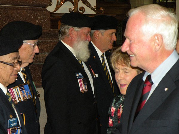 Governor General David Johnston and his wife Sharon greet veterans at the B.C. legislature Monday.