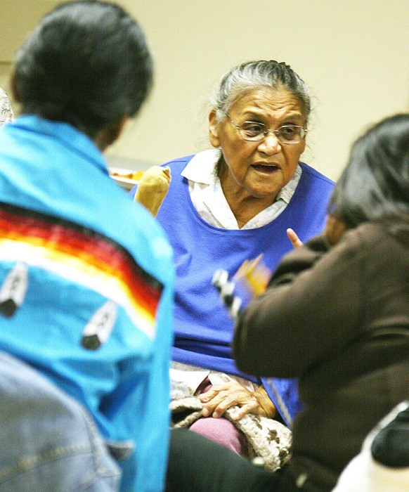 A member of the Sookenai Singers Drum Group performs during a one year anniversary celebration of the Qat'muk Declaration at the Akisqnuk Band Hall. More than 40 people came out for the local event.