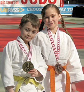 Graham and Emma Norquay with their medals at the Edmonton International Judo Championships.