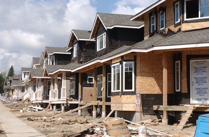 Townhouses under construction in Surrey.