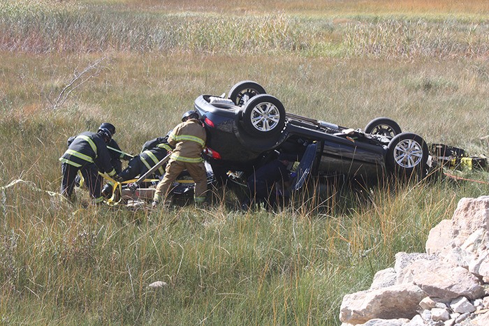 Firefighters were required to extract the two women from the flipped Hyundai.