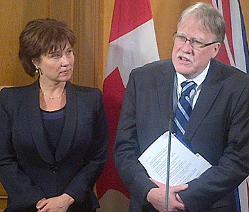 Premier Christy Clark and B.C. Federation of Labour president Jim Sinclair speak after meeting at the B.C. legislature Wednesday.