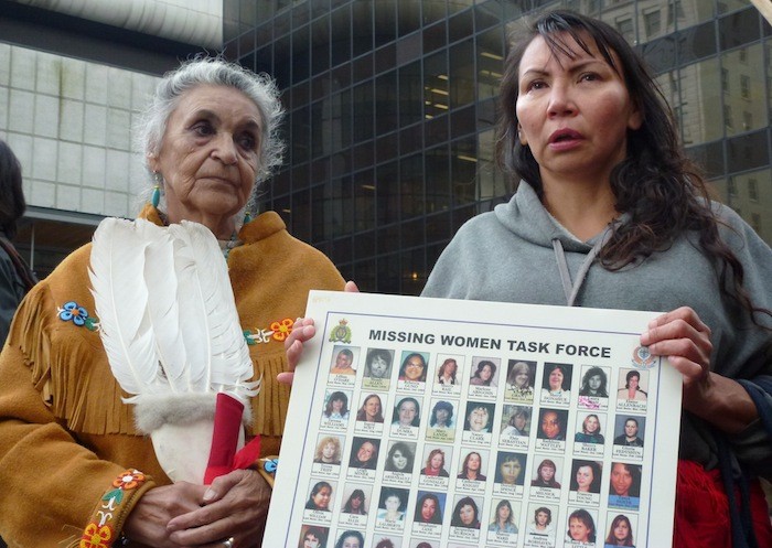 Protesters outside the Missing Women Inquiry in downtown Vancouver Tuesday.