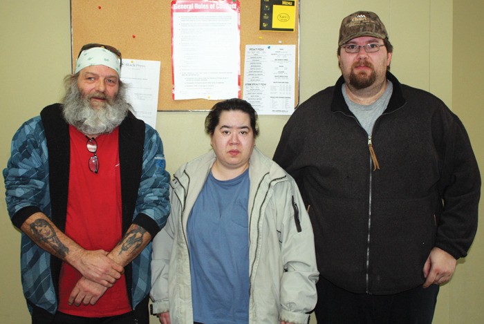 Marc Normand (right) Trina Wilder and Edward Keith Rivers have concerns about Columbia House resident Jean Wilder