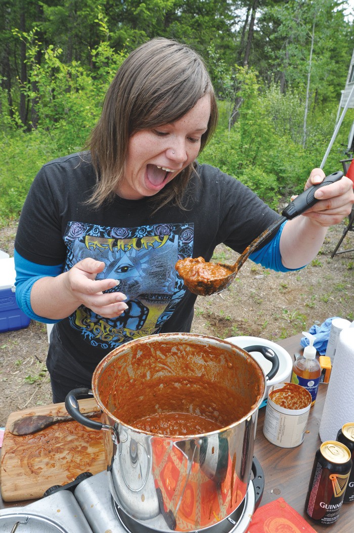 Kate Irwin tests out some chili at last year's Spilli Chilli event that took place at the Spillimacheen Fair Grounds.