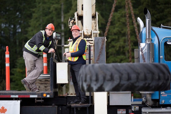 NDP leader John Horgan operates a crane at a campaign stop in Maple Ridge to promote his trades training promises.