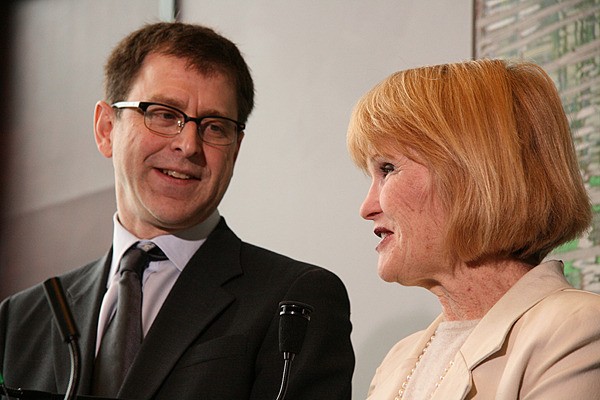 MLA Adrian Dix introduces former finance and health minister Joy MacPhail in Vancouver Thursday.