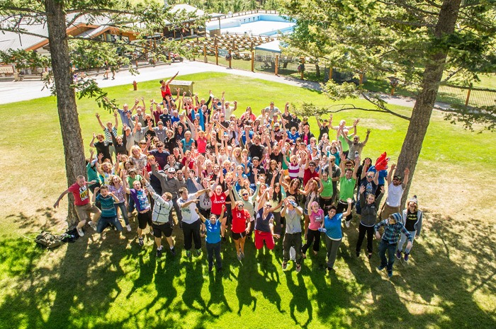 The staff at Fairmont Hot Springs jump for joy as the resort