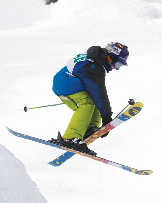 Panorama Freeride Club member Emmet Stange performs a trick called a mute grab.