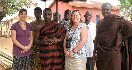 Kristin Olsen  who was being greeted by the Chief of a local village she visited outside of Kumasi.