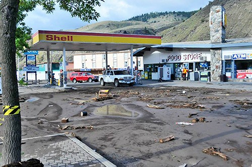 The aftermath of a flash flood in Cache Creek shows the mud and debris that was left behind.