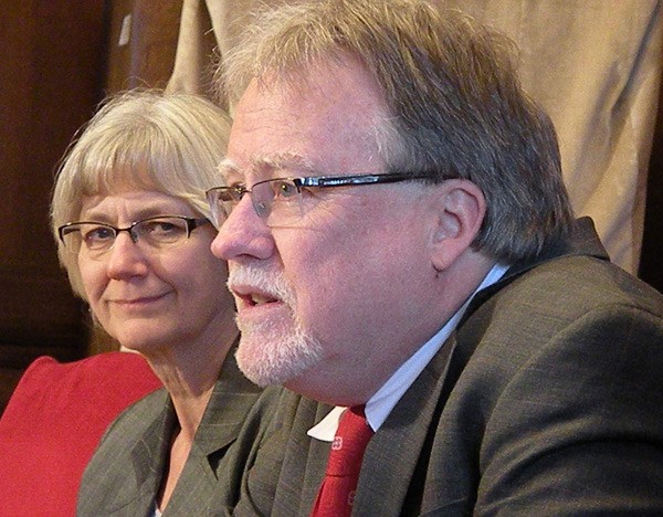 B.C. Federation of Labour vice-president Irene Lanzinger and president Jim Sinclair speak to reporters at the legislature Wednesday.