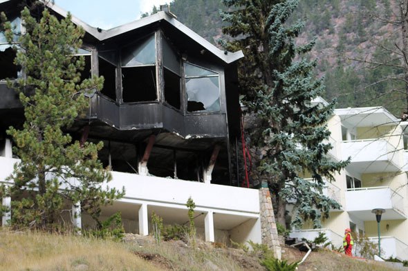 The old Radium Hot Springs Lodge was noticeably charred on Monday morning after a fire caused damage on Sunday