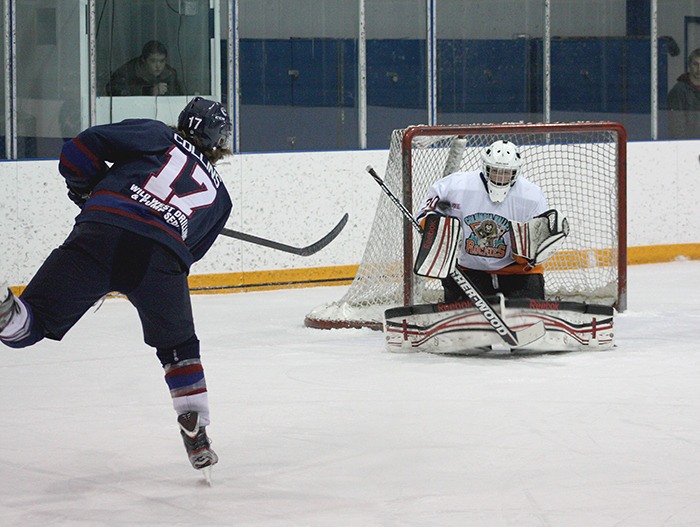 Rockies goalie Brody Nelson makes a first period stop against Creston on December 8.