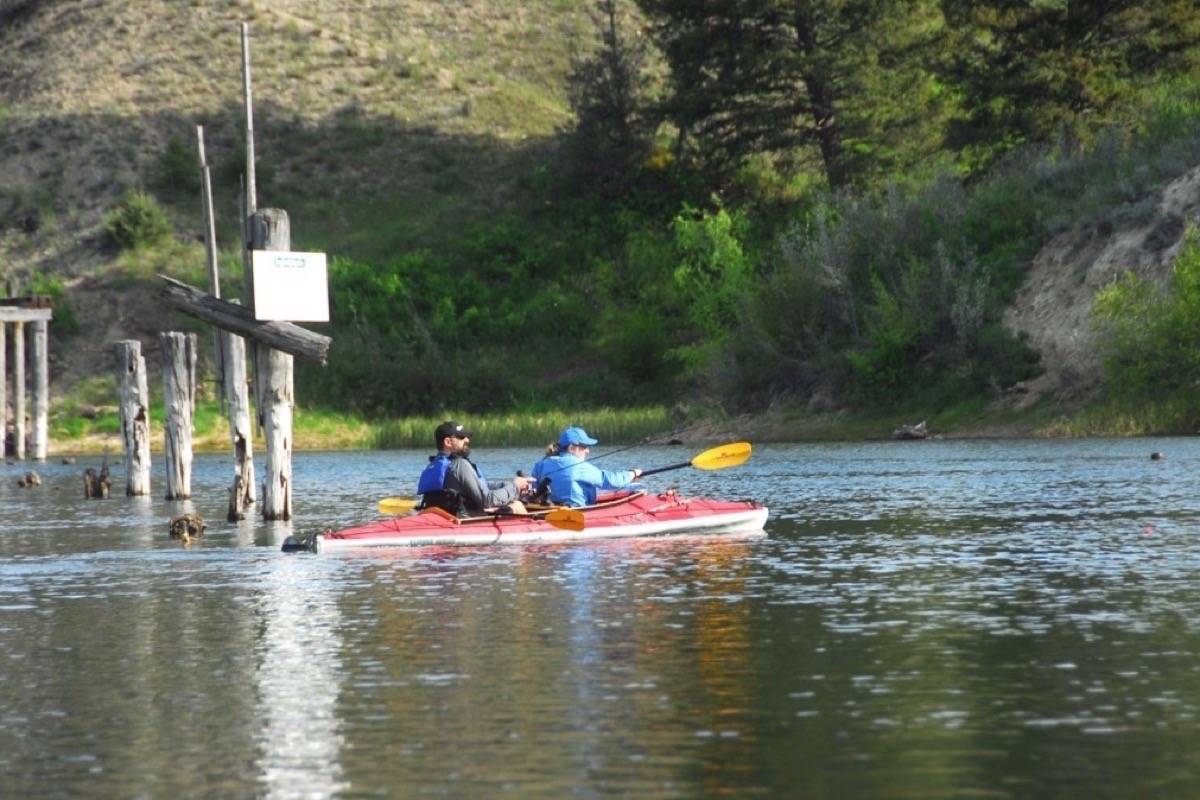 Kayakers head off on a beautiful paddle from the Athalmer boat launch Saturday, May 20. The Columbia Wetlands Stewardship Partners is hoping to install toilets at historic launches such as Athalmer along the Columbia River. Photo by Lorene Keitch