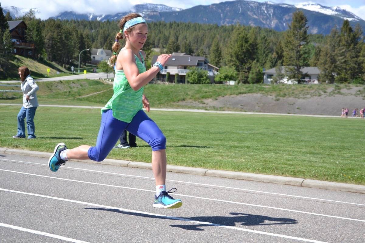 Emmy Lou Grieve gives it her all during the WES track and field day, held Thursday, May 2 at D.T.S.S.