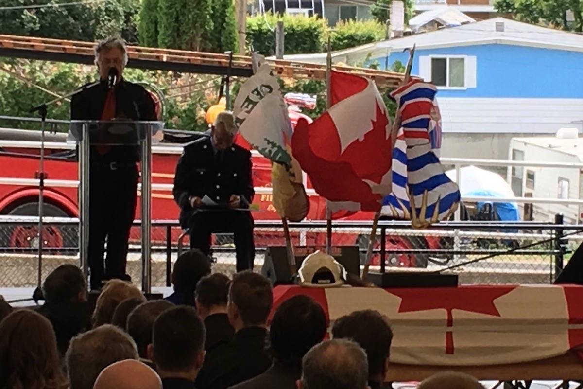 Clayton Cassidy’s brother, Patrick, speaks at the service for the fire chief who died after he was swept away by heavy floods in early May. The line of duty memorial was held Saturday at Cache Creek Park. Credit: Kevin MacDonald