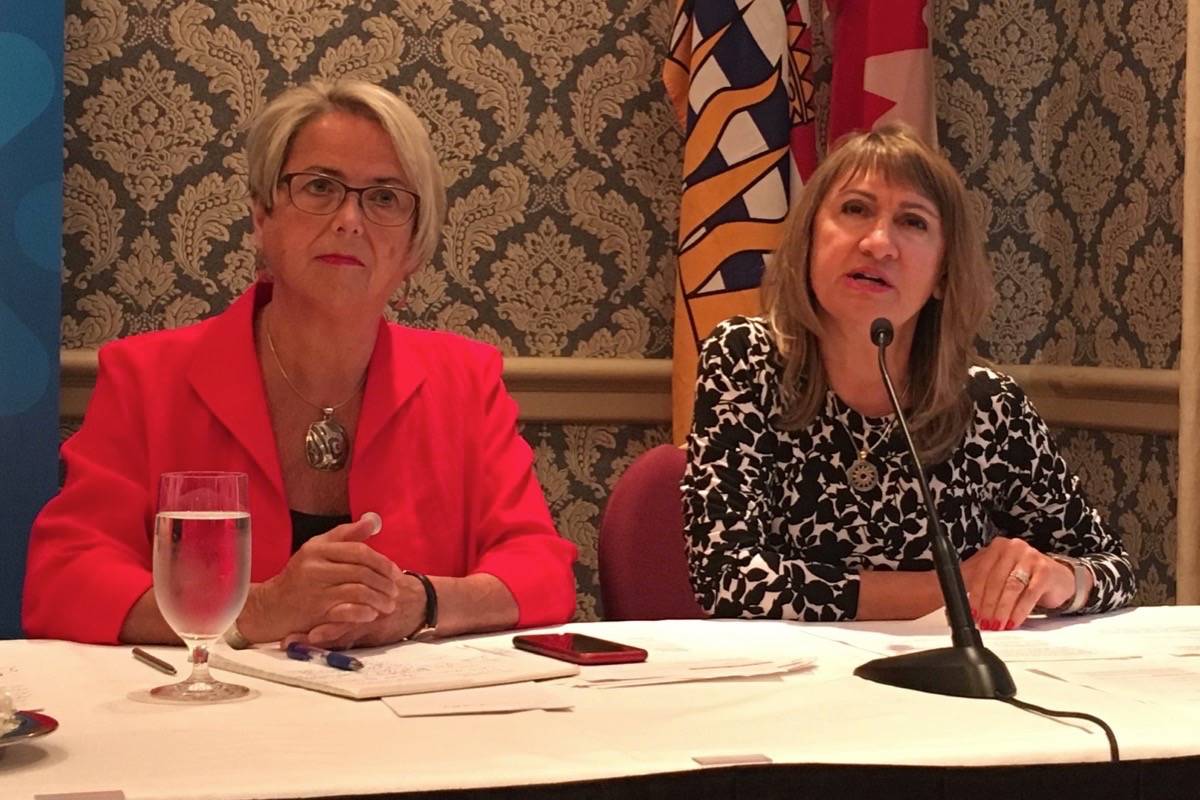 New Westminster MLA Judy Darcy and Rita Notarandrea, CEO of Canadian Centre on Substance Use, speak at a news conference in Vancouver on Tuesday. Ashley Wadhwani, Black Press.