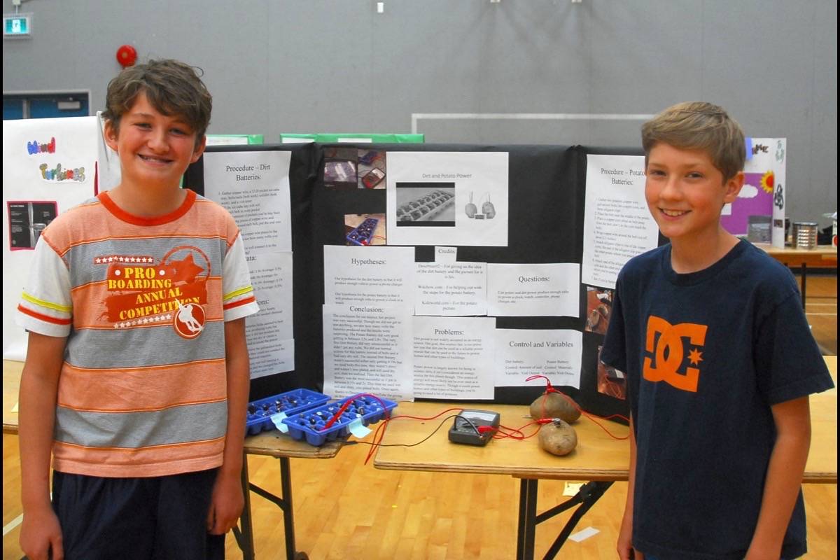 J.A. Laird held its first-ever Environmental Fair last week. Students investigated a range of topics, including Aidan Guest and Peyton Cooper who looked at potato vs. dirt-powered power.                                Photos by Lorene Keitch