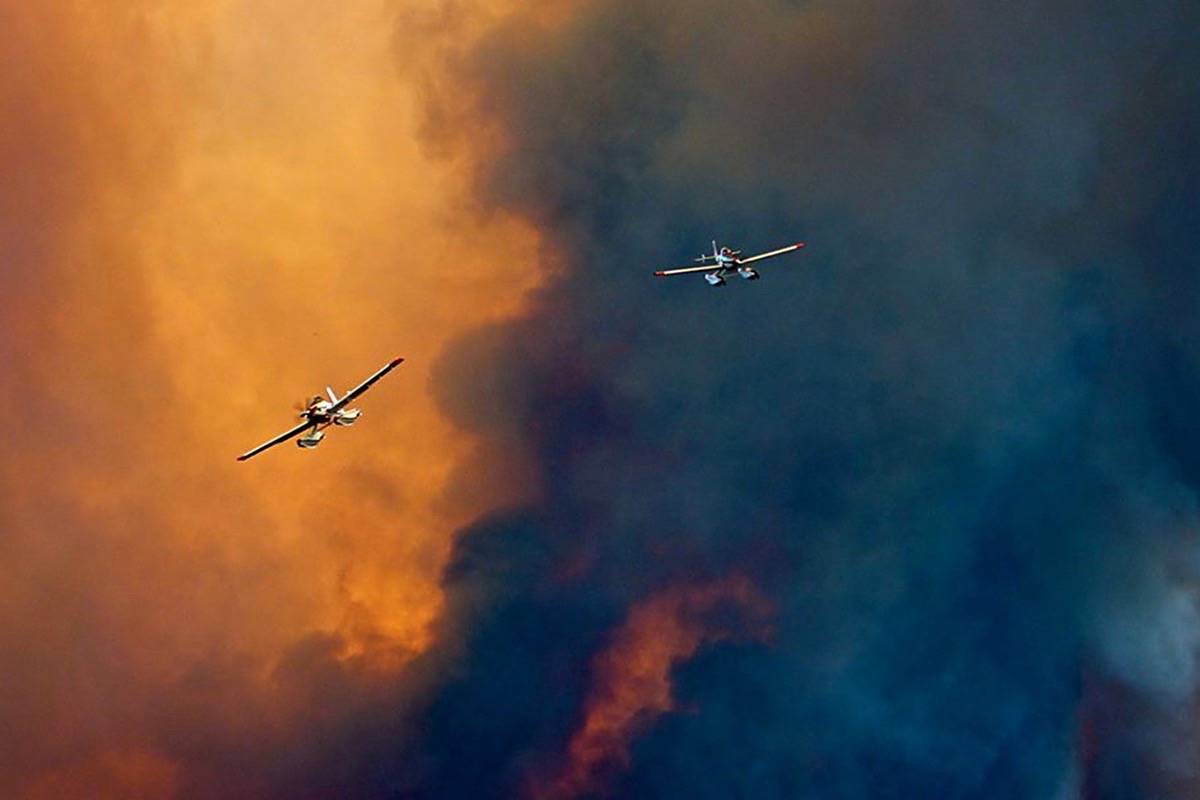 The fire has lots of air support including skimmers (pictured), filling out of Watson Lake and water bombers. Bob Grant photos.                                The fire has lots of air support including skimmers (pictured), filling out of Watson Lake and water bombers. Bob Grant photos.