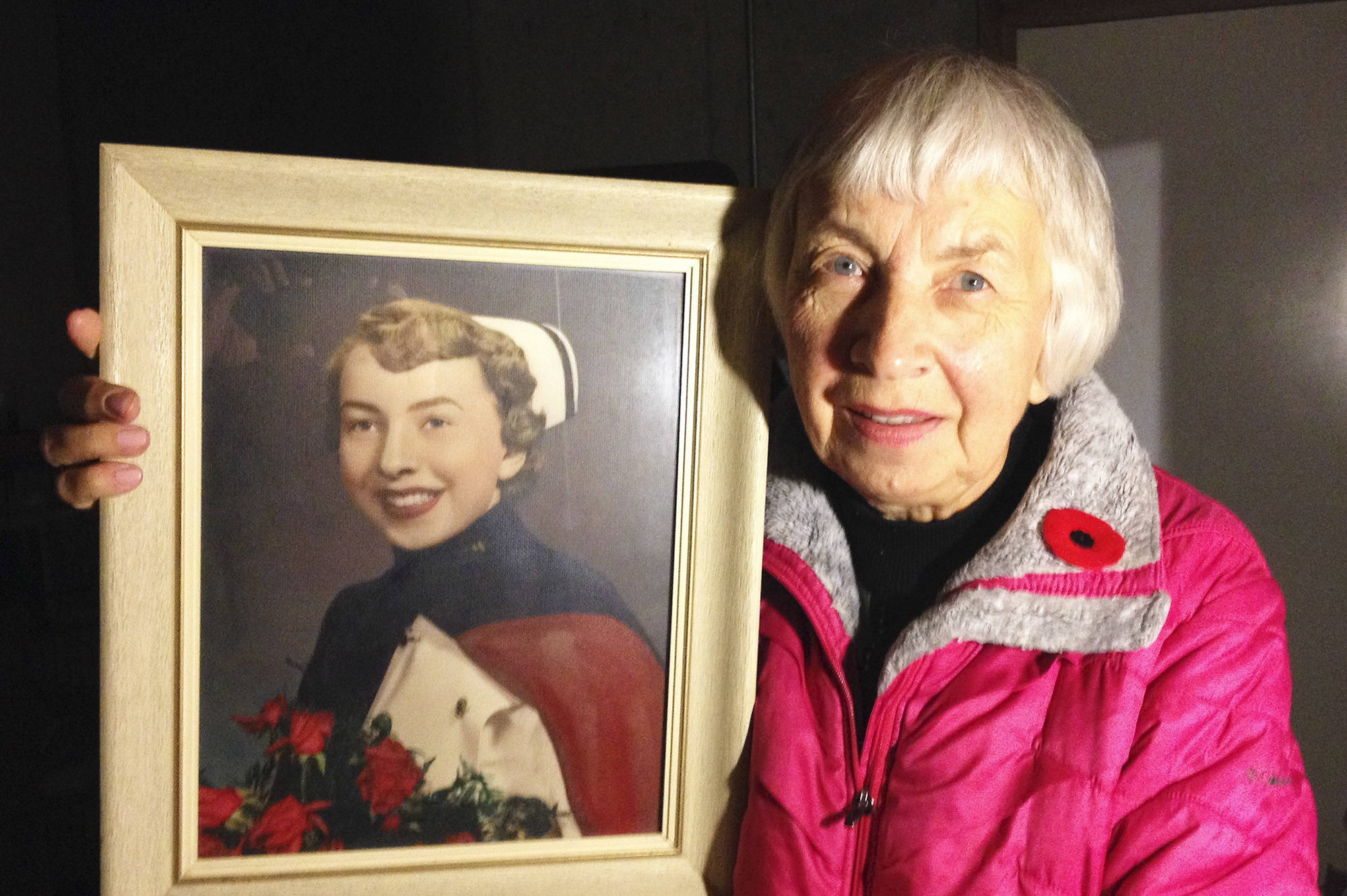 Image credit: Scales family                                Sally Scales, who ended her life under the new Medical Assistance in Dying (MAiD) law, holds a photo of herself as a nurse in earlier years.