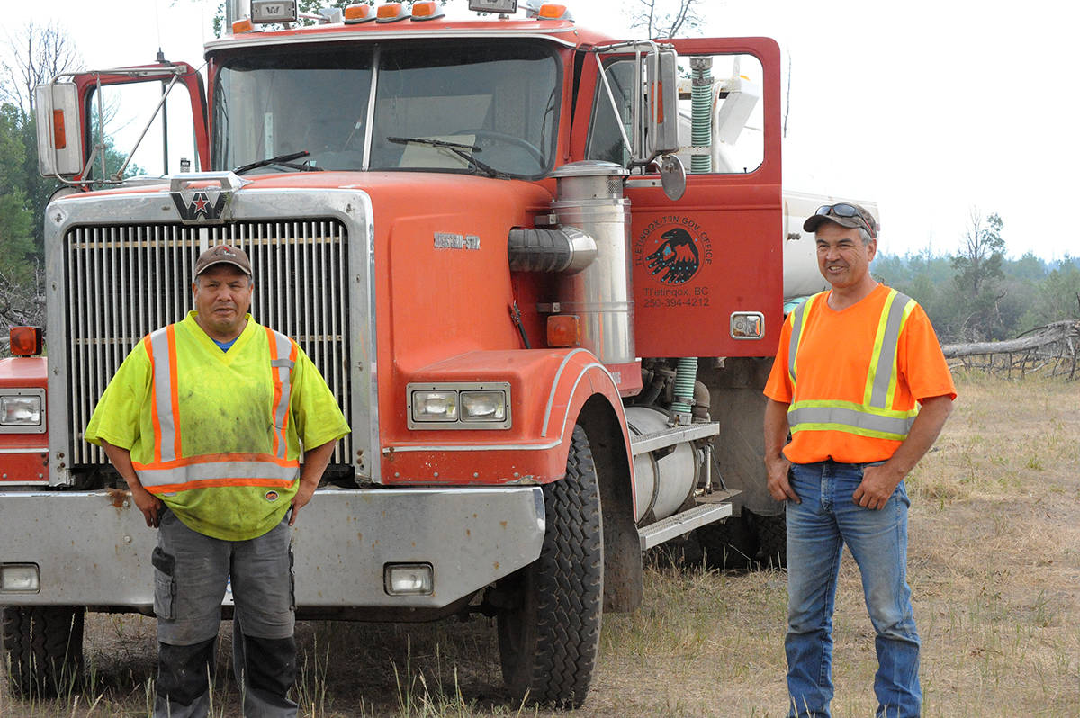 Anaham band members Gregory Charleyboy and Ron Elkins have been working the water truck for Tl’entinqox t’in since fires broke out Friday.
