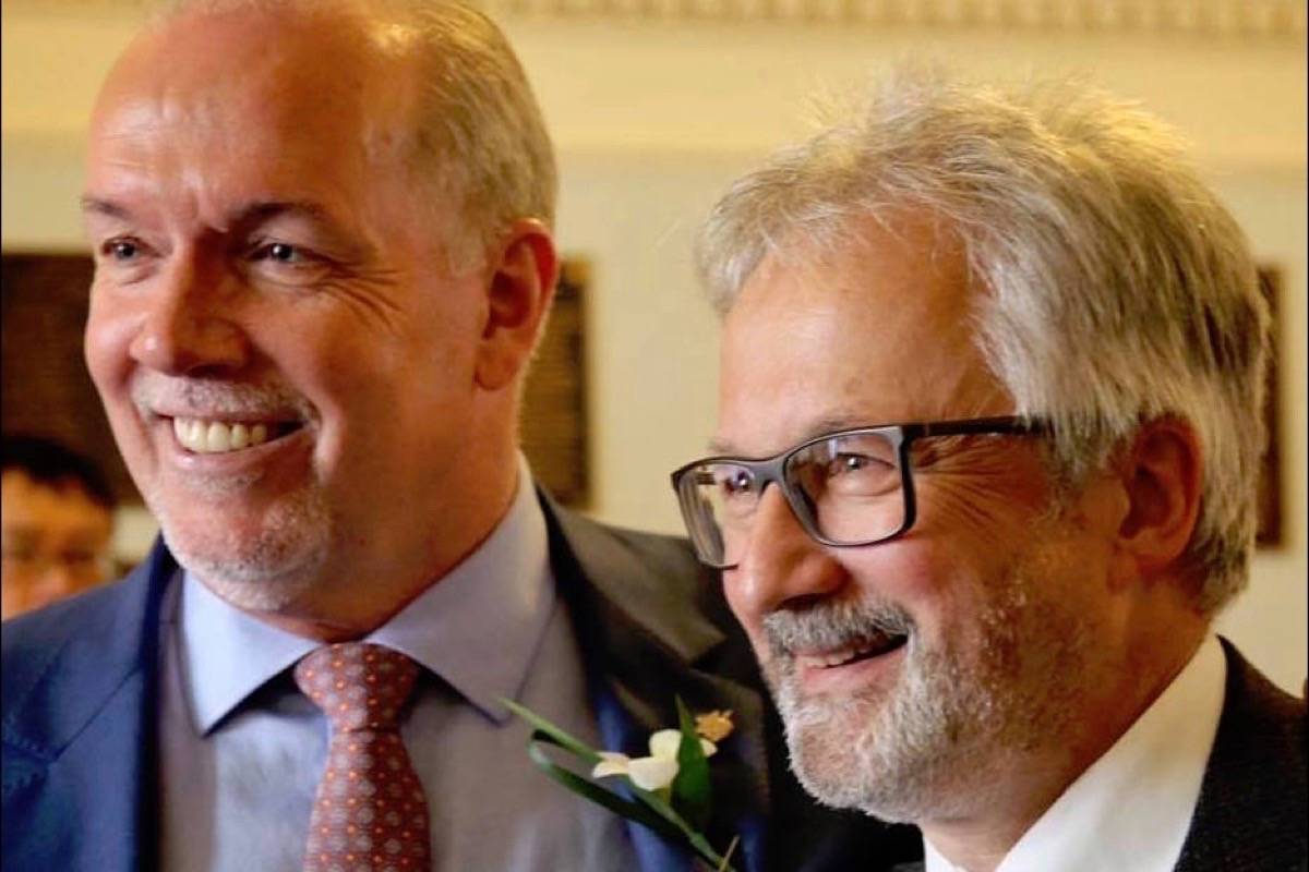 Premier-designate John Horgan and Vancouver councillor Geoff Meggs at swearing-in ceremony for NDP MLAs in May. (Stepan Vdovine/Facebook)