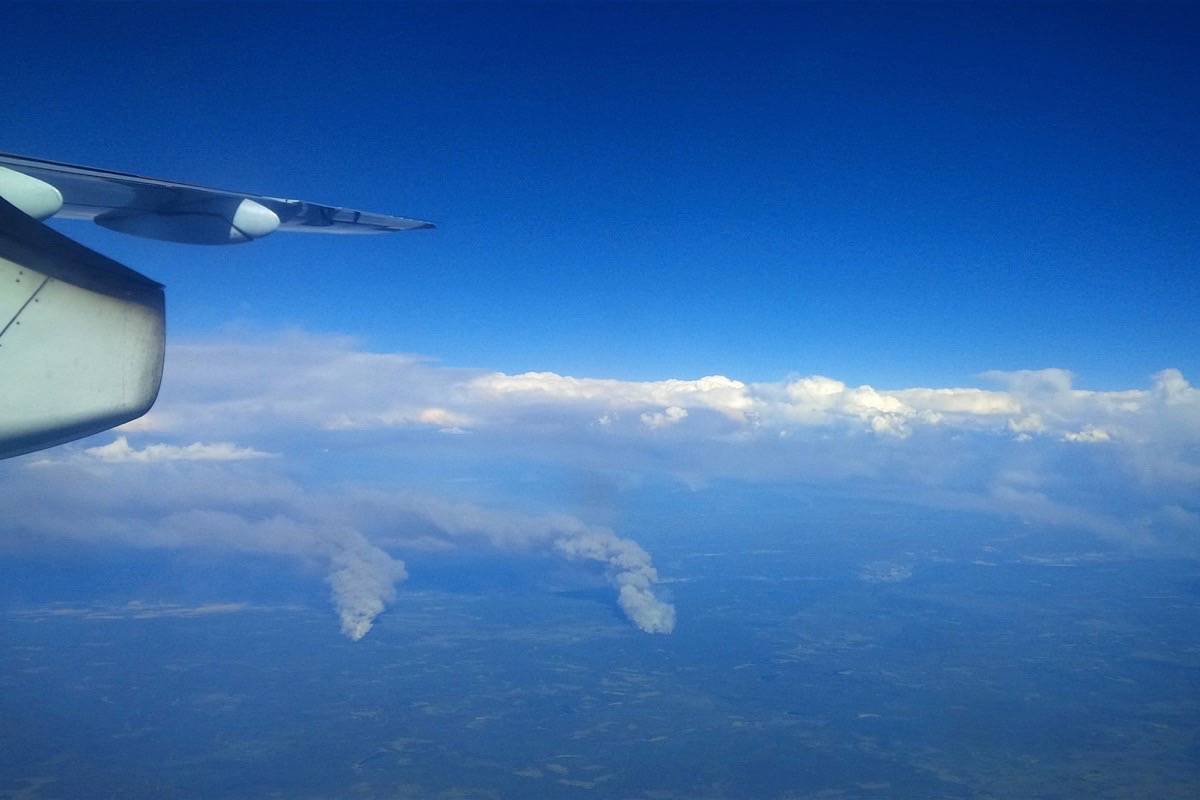 Aerial view south of Williams Lake Friday afternoon shows dry lightning storm passing over, leaving fire starts behind. Lightning sparked more than 100 new fires Friday. (Black Press)